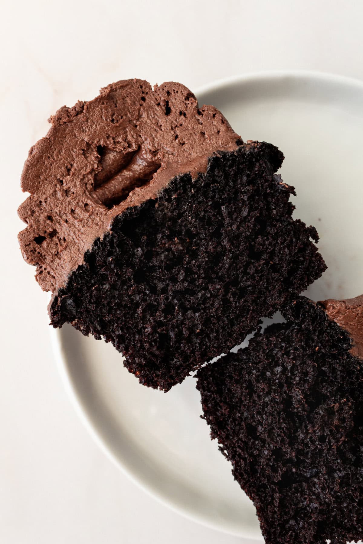This is the Ultimate Chocolate Cupcake Recipe, with a rich, moist chocolate cake with a tender crumb and a velvet chocolate frosting. These are the best chocolate cupcakes you'll ever taste, with a deep cocoa flavor that melts in your mouth. Not only are they delicious, but this easy chocolate cupcake recipe takes just minutes to prepare. If you are looking for moist chocolate cupcakes that are 5-star rated, this is the recipe for you!