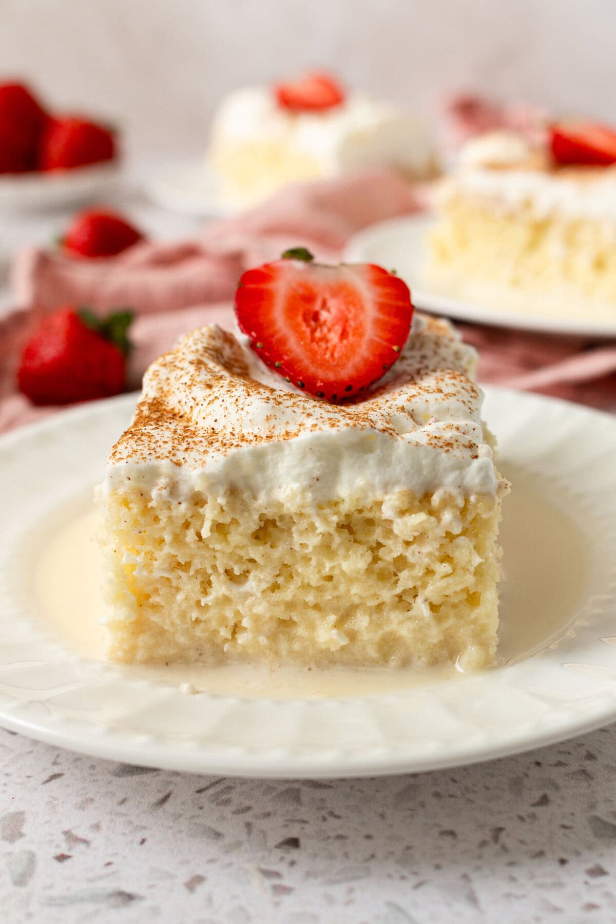 Tres Leches Cake. A classic Mexican dessert made with a vanilla sponge cake soaked with three kinds of milk -- heavy cream, evaporated milk and sweetened condensed milk and topped with fresh sweetened whipped cream. An authentic Mexican dessert recipe!