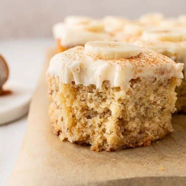 Jeff's BEST Banana Cake Recipe is a moist and tender banana cake with a creamy, sweet, and buttery cream cheese frosting. Some say it is the best banana cake in the world! This moist banana cake with cream cheese frosting is baked in a 9×13 pan and is always a hit!