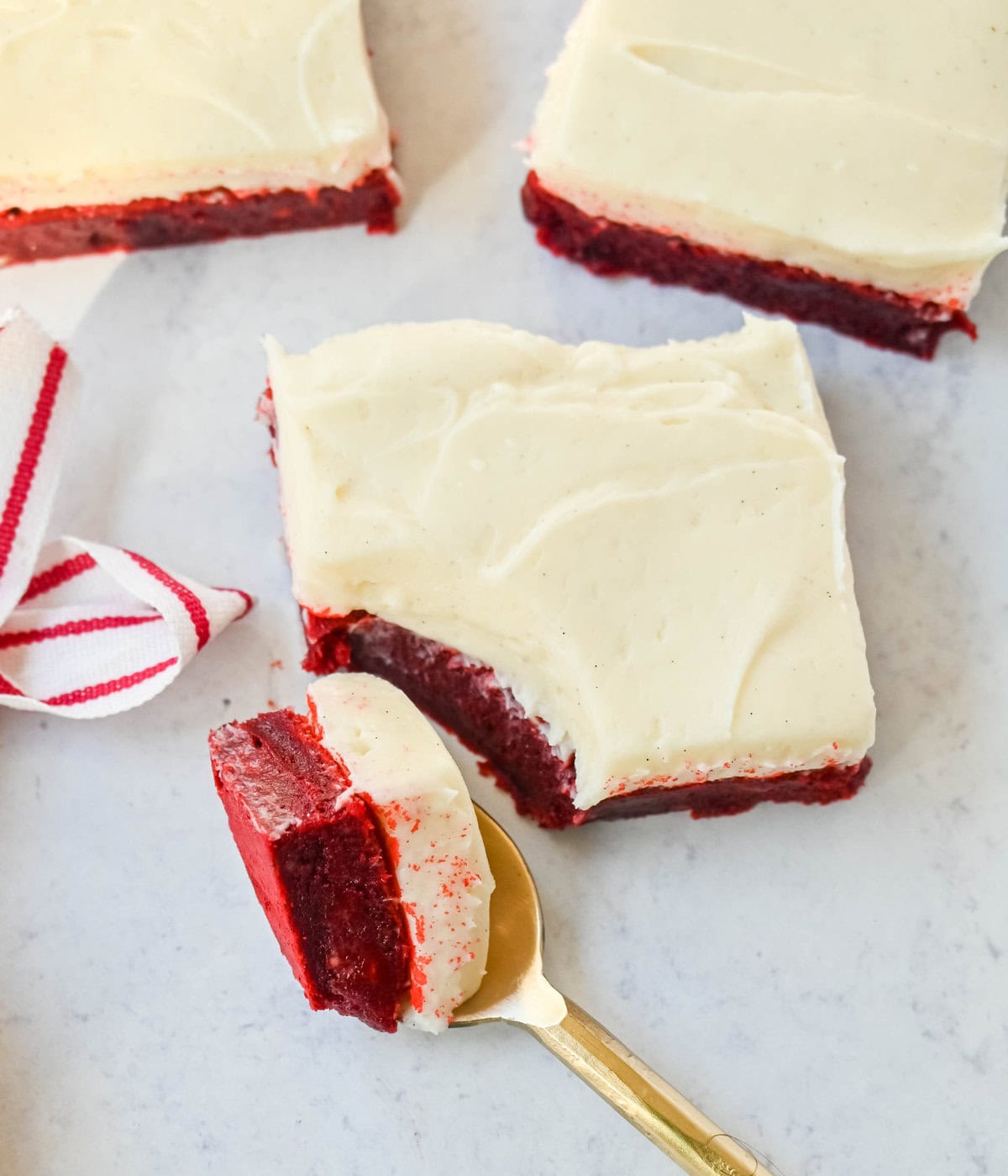 Red velvet brownies are a decadent twist on the classic red velvet cake, combining the color, subtle cocoa flavor, and creamy texture into the perfect brownies. These homemade Red Velvet Brownies with a sweet cream cheese frosting are fudgy and rich with a tangy and sweet cream cheese frosting.