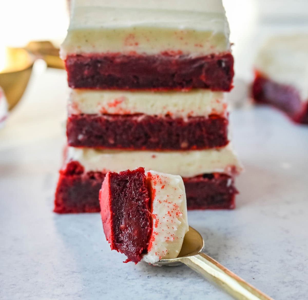 Red velvet brownies are a decadent twist on the classic red velvet cake, combining the color, subtle cocoa flavor, and creamy texture into the perfect brownies. These homemade Red Velvet Brownies with a sweet cream cheese frosting are fudgy and rich with a tangy and sweet cream cheese frosting. 