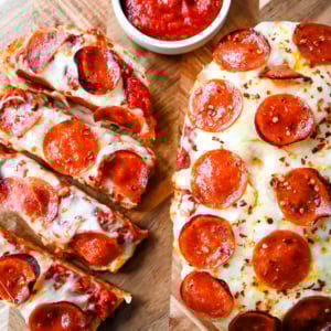 Homemade French Bread Pizzas. If you love the flavor of homemade pizza but want something simple, fast, and incredibly tasty, French bread pizzas are the perfect fix. This Garlic Butter French Bread Pizza starts with garlic butter brushed on the bread and topped with pizza sauce, mozzarella cheese, and pepperoni.