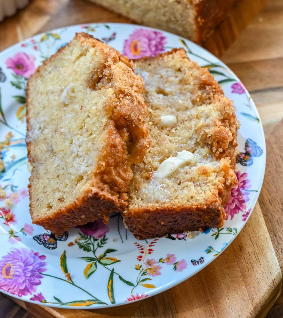 If you are looking for a moist, tender, flavorful, melt-in-your-mouth banana bread, this is the best banana bread recipe! It is made with both butter and oil, sour cream and buttermilk, and ripe, sweet bananas for baking up the most perfect banana bread.