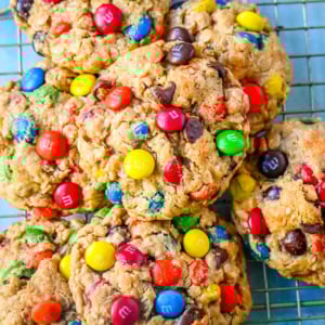 Gluten-Free Monster cookies are the perfect combination of oats, peanut butter, chocolate chips, and M&M's. The best part? They’re naturally gluten-free and naturally flourless. Whether you’re gluten-sensitive, celiac, or just love a hearty cookie, this Flourless Monster Cookie recipe will have you baking up a storm.