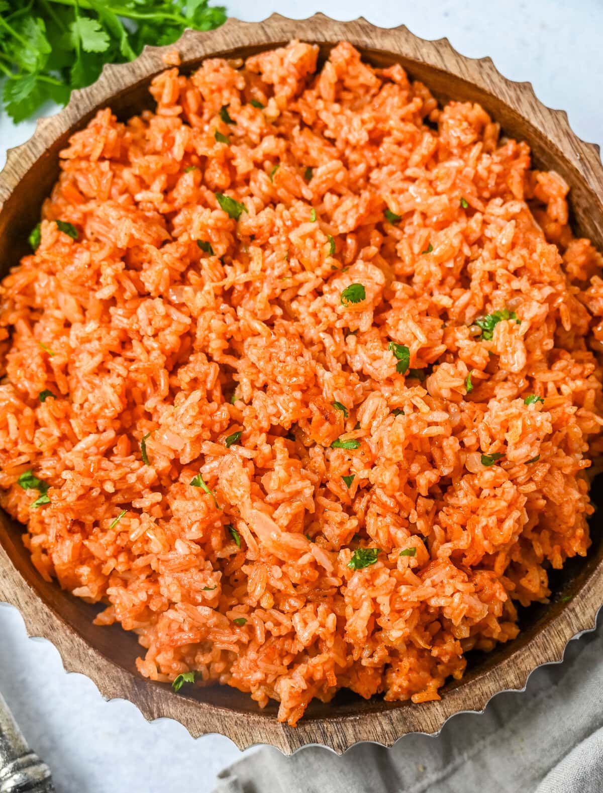 This easy Spanish Rice Recipe — also known as Mexican rice — is a flavorful, vibrant side dish made with sautéed onions, long-grain rice, Mexican spices, and fresh tomato sauce. This is the best Spanish rice recipe and is so easy to make!