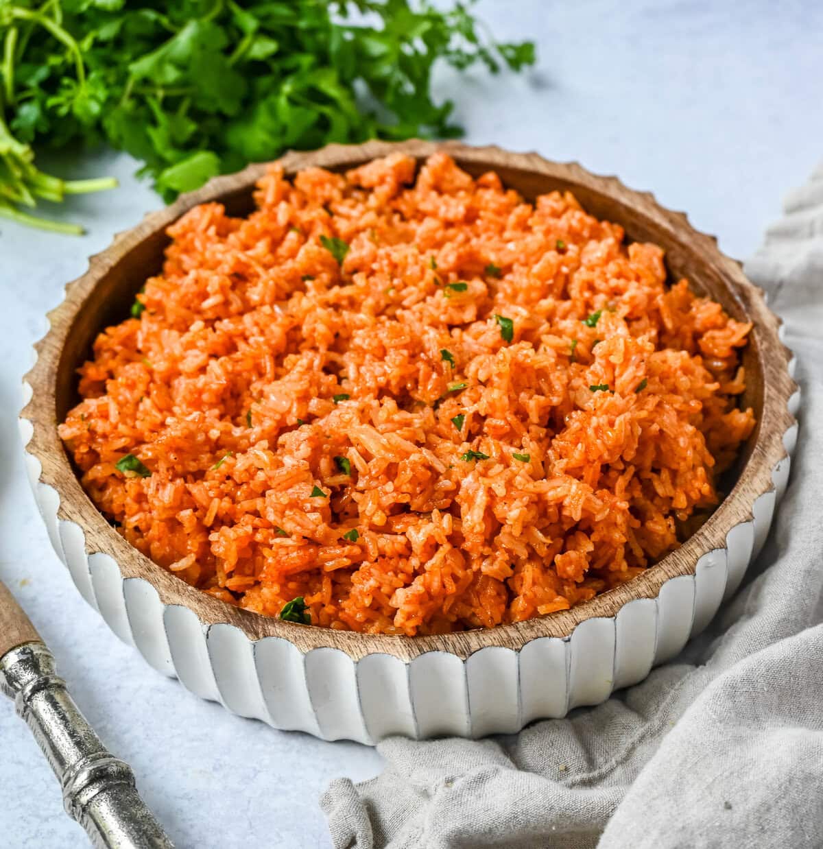 This easy Spanish Rice Recipe — also known as Mexican rice — is a flavorful, vibrant side dish made with sautéed onions, long-grain rice, Mexican spices, and fresh tomato sauce. This is the best Spanish rice recipe and is so easy to make!