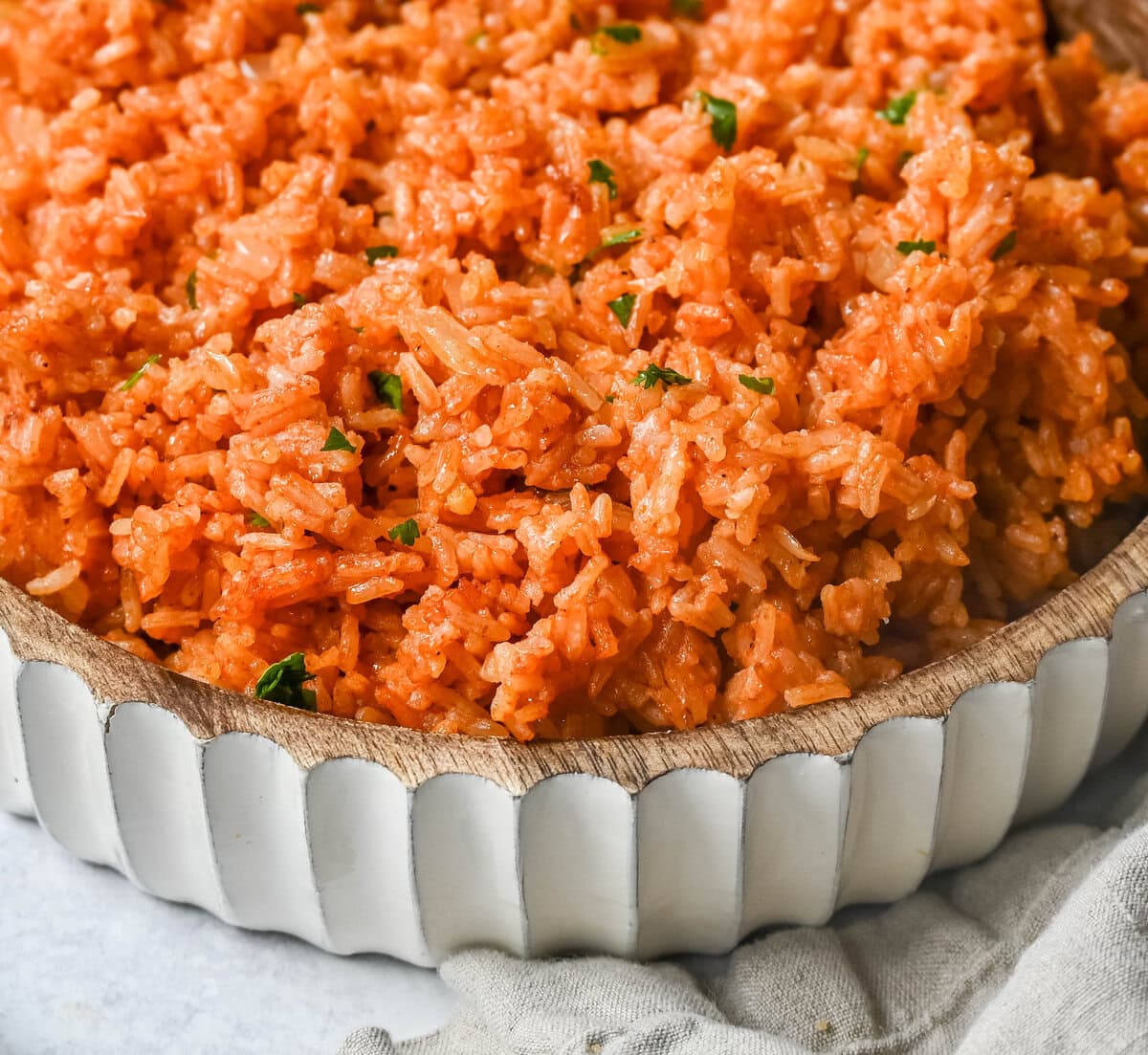 This easy Spanish Rice Recipe — also known as Mexican rice — is a flavorful, vibrant side dish made with sautéed onions, long-grain rice, Mexican spices, and fresh tomato sauce. This is the best Spanish rice recipe and is so easy to make!