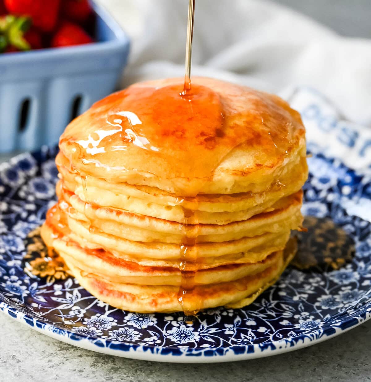 These light and fluffy Greek Yogurt Pancakes are higher protein, lower-fat and have a melt-in-your-mouth texture. You will love this healthy Greek yogurt pancake recipe!