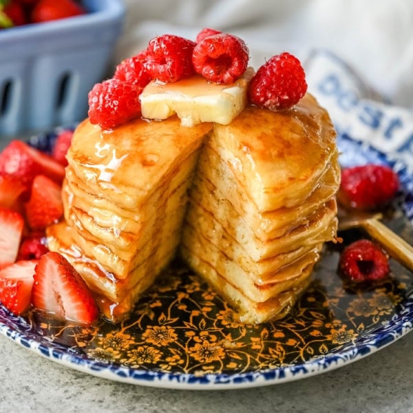 These light and fluffy Greek Yogurt Pancakes are higher protein, lower-fat and have a melt-in-your-mouth texture. You will love this healthy Greek yogurt pancake recipe!