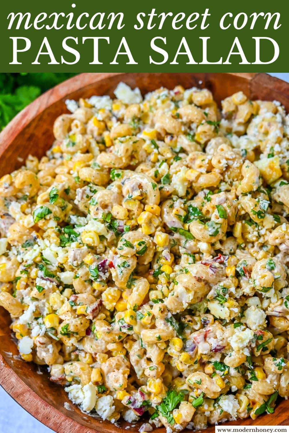 This Mexican Street Corn Pasta Salad is made with fresh corn, pasta, red onion, jalapeno, fresh cilantro, all tossed in a perfectly spiced dressing and topped with cotija cheese, Mexican spices, and fresh lime. It’s street food meets comfort food and it is so addictive. Perfect for a summer BBQ, potluck dish, or the perfect side dish, this Mexican Street Corn Pasta Salad delivers every time.