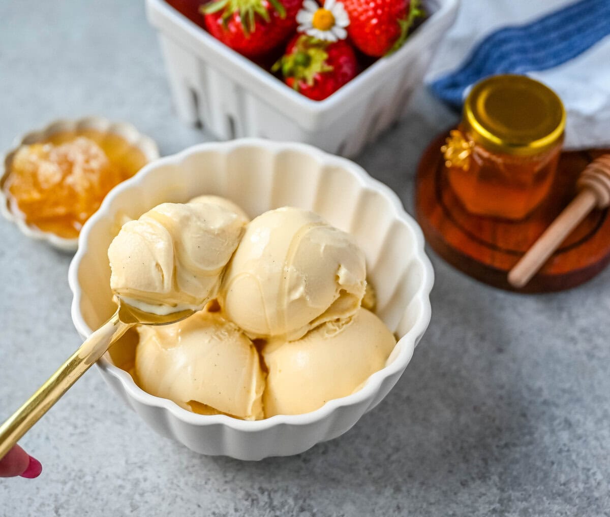 This homemade honey ice cream recipe features a rich, creamy texture with the natural sweetness of real honey and no added refined sugars. This is such a nourishing ice cream recipe with dried milk powder and egg yolks for extra protein and rich custard flavor. This Walt's Dream Ice cream is healthier version of homemade ice cream!