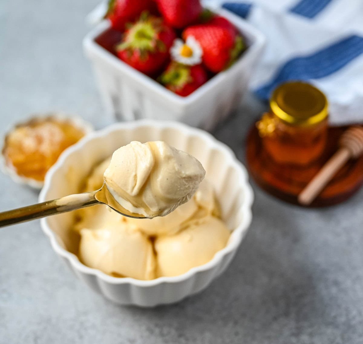 This homemade honey ice cream recipe features a rich, creamy texture with the natural sweetness of real honey and no added refined sugars. This is such a nourishing ice cream recipe with dried milk powder and egg yolks for extra protein and rich custard flavor. This Walt's Dream Ice cream is healthier version of homemade ice cream!