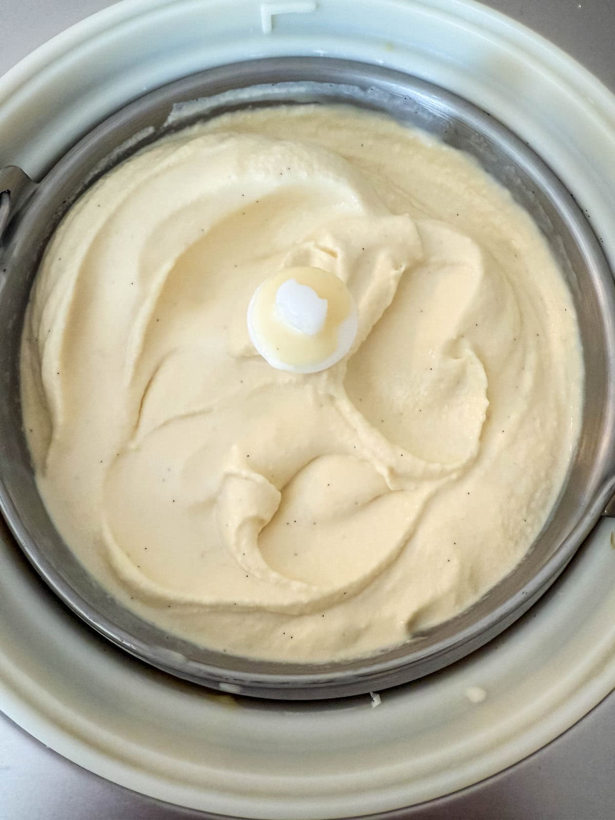 This homemade honey ice cream recipe features a rich, creamy texture with the natural sweetness of real honey and no added refined sugars. This is such a nourishing ice cream recipe with dried milk powder and egg yolks for extra protein and rich custard flavor. This Walt's Dream Ice cream is healthier version of homemade ice cream!
