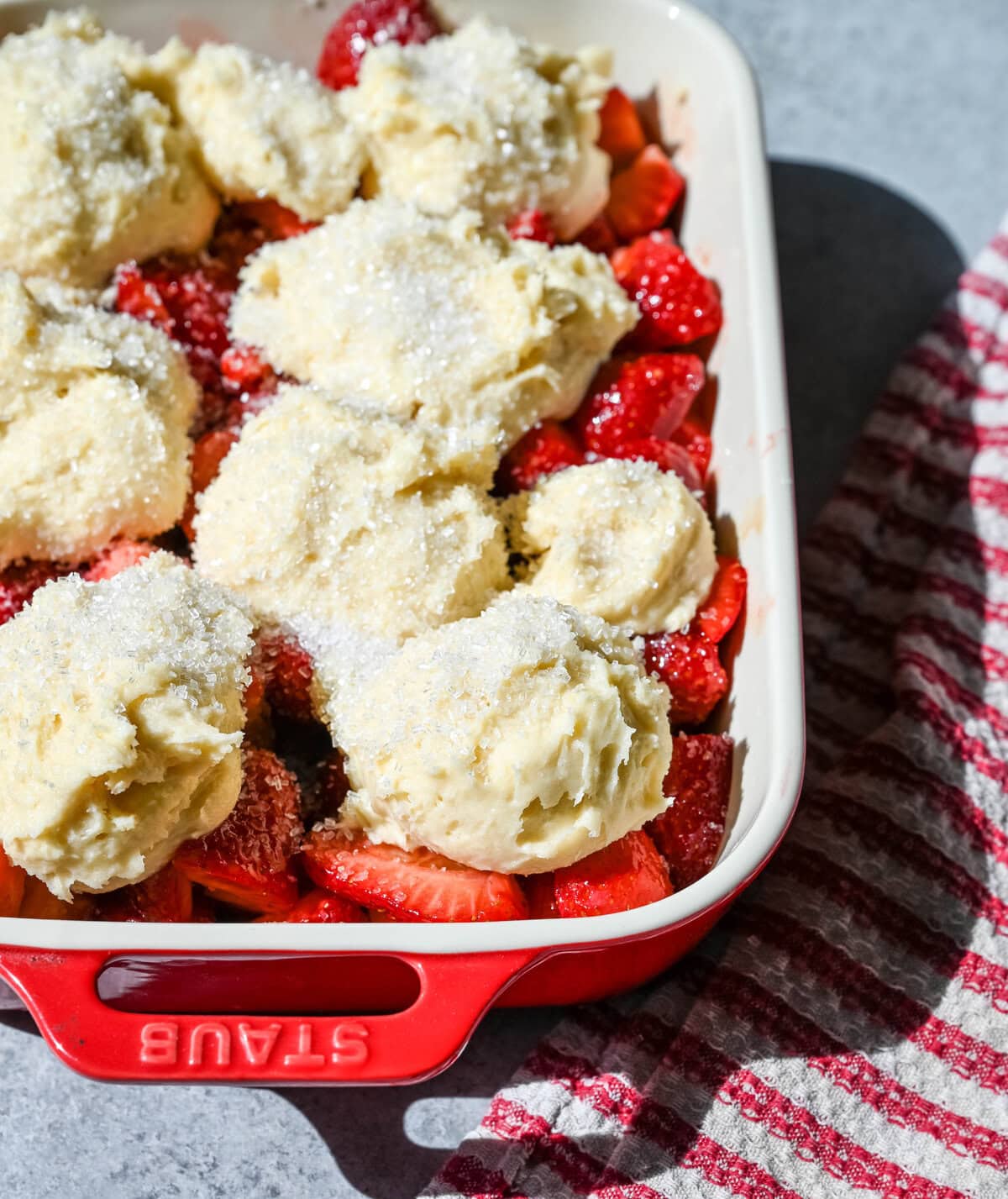 How to make homemade strawberry cobbler using fresh strawberries. This dessert with strawberries is perfect for summer!