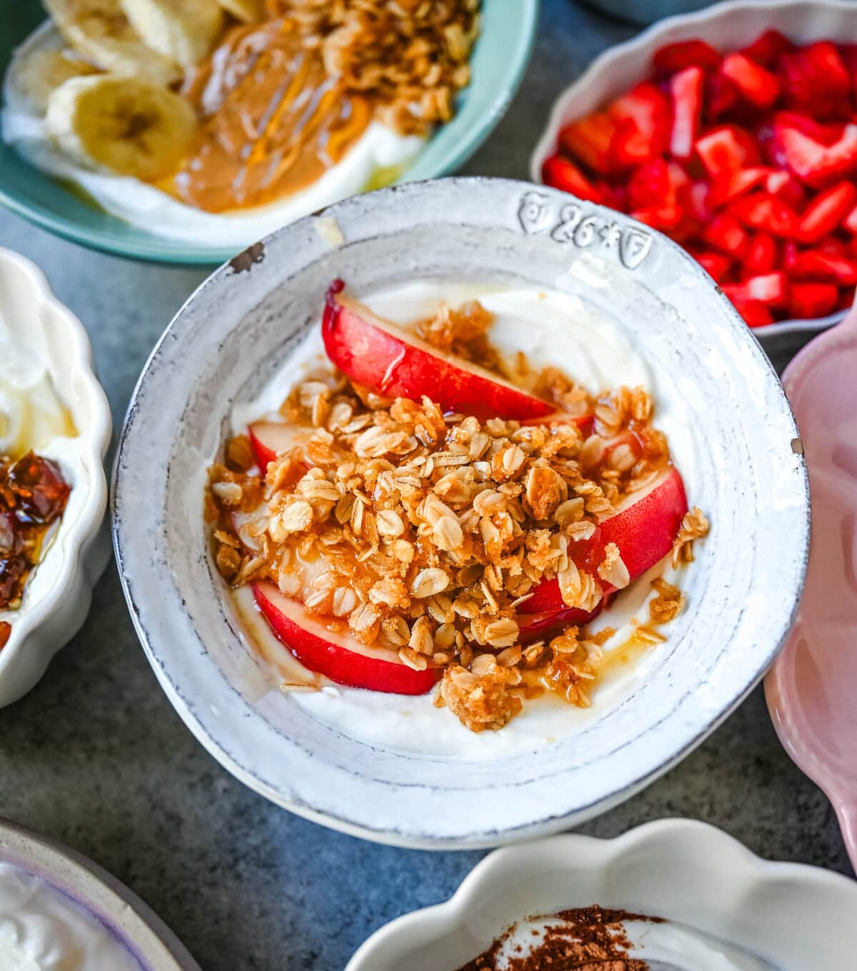 Peach Pie Greek Yogurt Bowl. Greek yogurt, fresh peaches, oat crumble.