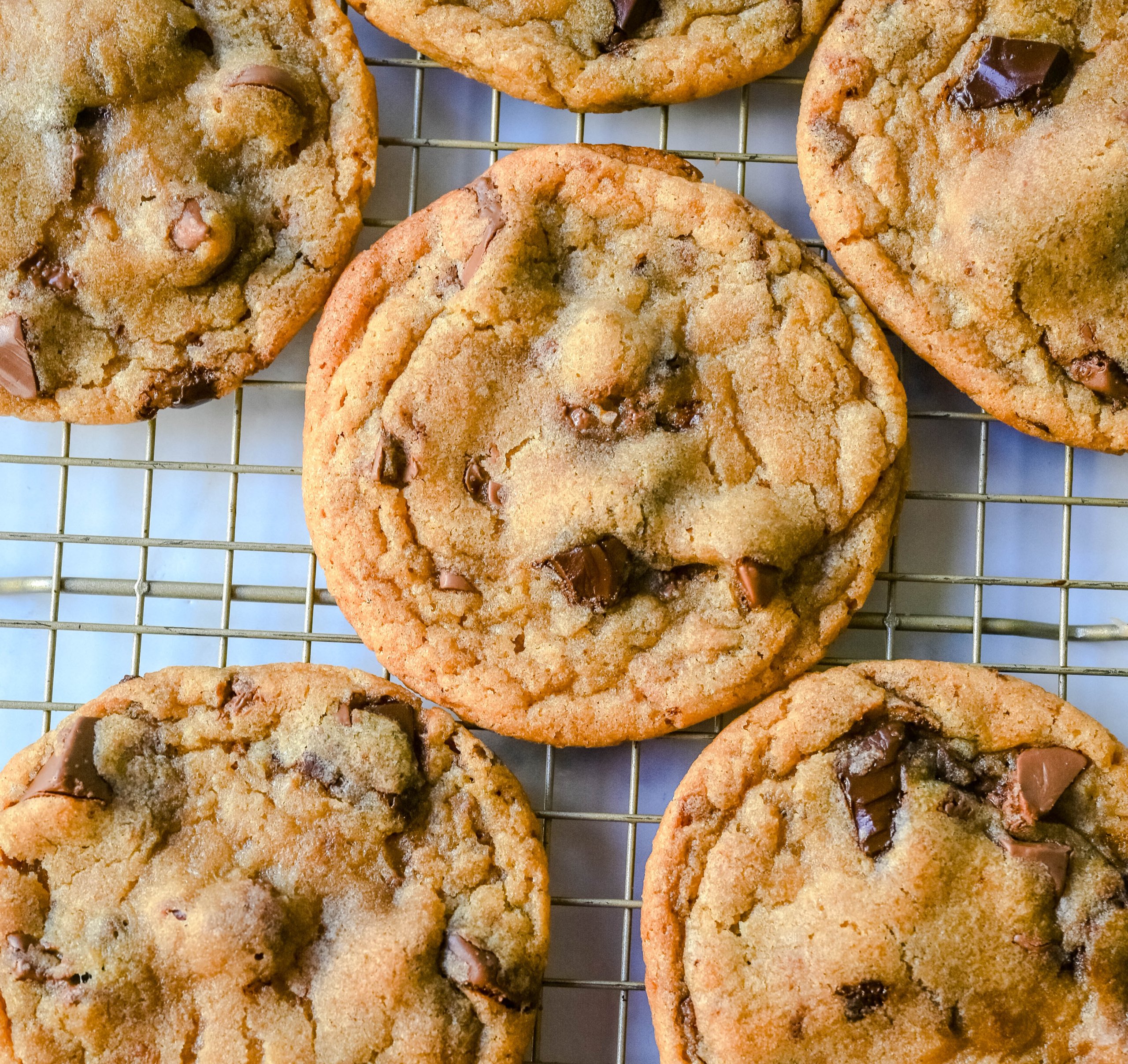 Are you team crispy or chewy? These thin and chewy chocolate chip cookies will win you over from the very first bite. Rich, buttery, and loaded with melty chocolate, these cookies are the perfect balance of crisp edges and soft, gooey centers. You are going to love these Thin and Chewy Chocolate Chip Cookies!