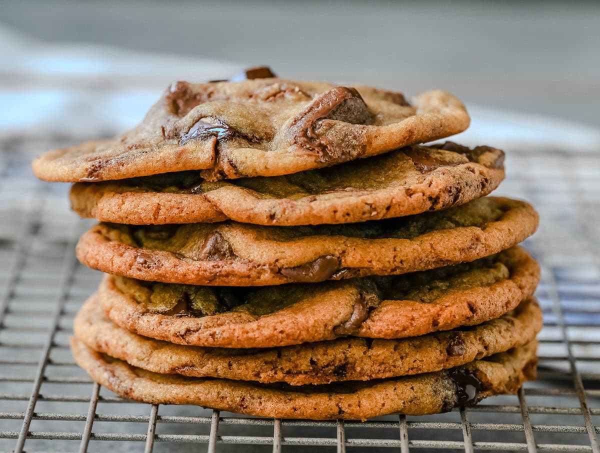 Are you team crispy or chewy? These thin and chewy chocolate chip cookies will win you over from the very first bite. Rich, buttery, and loaded with melty chocolate, these cookies are the perfect balance of crisp edges and soft, gooey centers. You are going to love these Thin and Chewy Chocolate Chip Cookies!