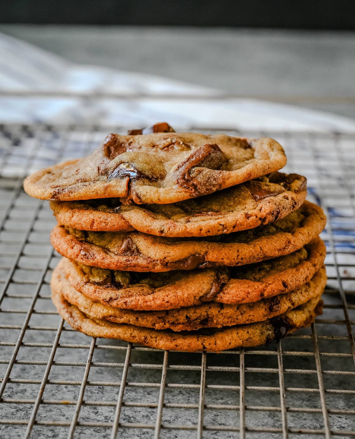 Are you team crispy or chewy? These thin and chewy chocolate chip cookies will win you over from the very first bite. Rich, buttery, and loaded with melty chocolate, these cookies are the perfect balance of crisp edges and soft, gooey centers. You are going to love these Thin and Chewy Chocolate Chip Cookies!