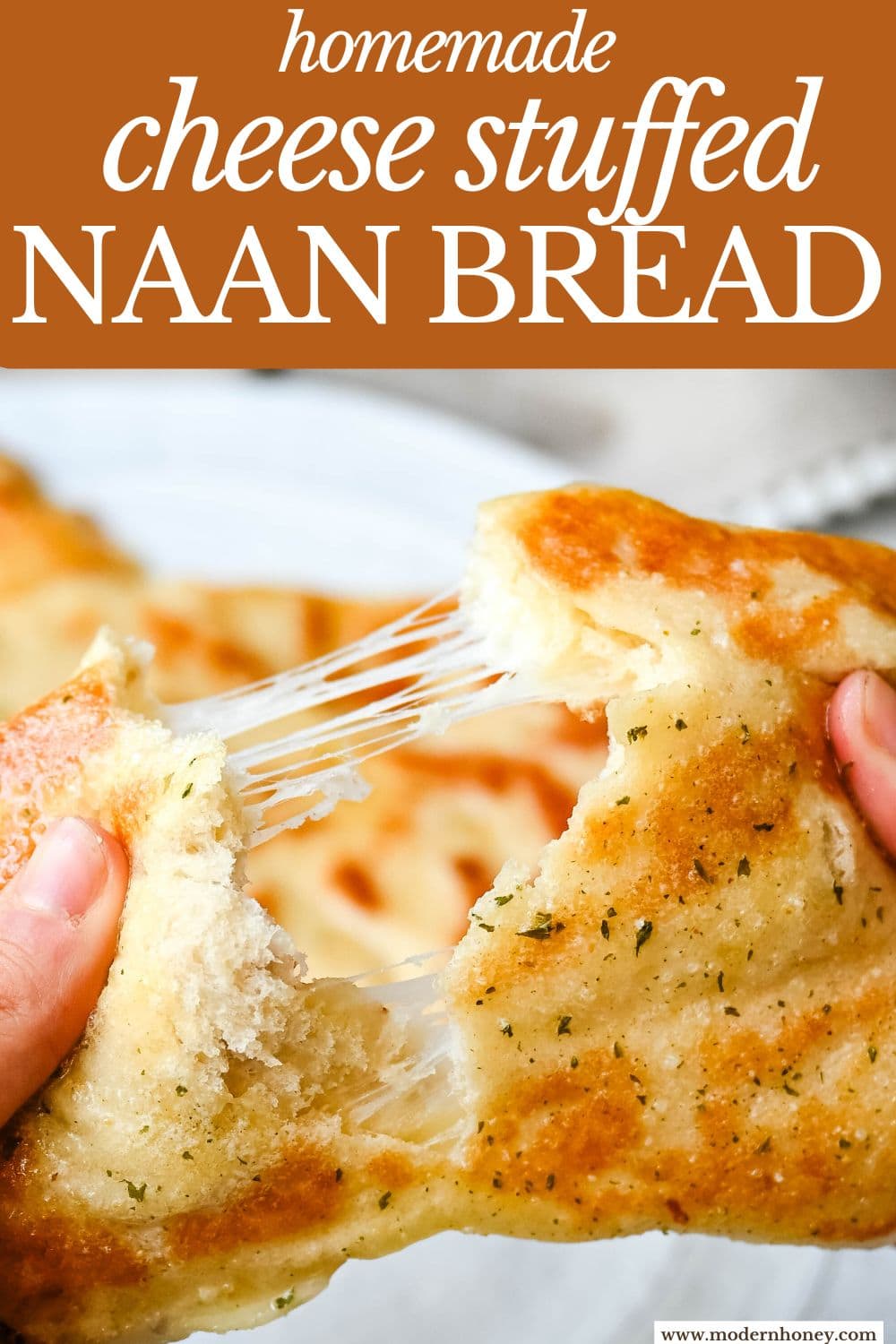 Homemade Cheesy Naan bread stuffed with mozzarella cheese, that is even better than what you find in restaurants. Cheese-stuffed naan is soft, slightly chewy, golden-brown on the outside, fluffy bread layers inside, and melty gooey cheese in the center.