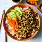 These Easy Korean Beef Bowls are a flavorful dinner that come together in just 20 minutes. Made with ground beef, garlic, ginger, soy sauce, sesame oil, and brown sugar or honey, all served over fluffy white rice.