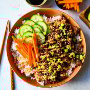 These Easy Korean Beef Bowls are a flavorful dinner that come together in just 20 minutes. Made with ground beef, garlic, ginger, soy sauce, sesame oil, and brown sugar or honey, all served over fluffy white rice.