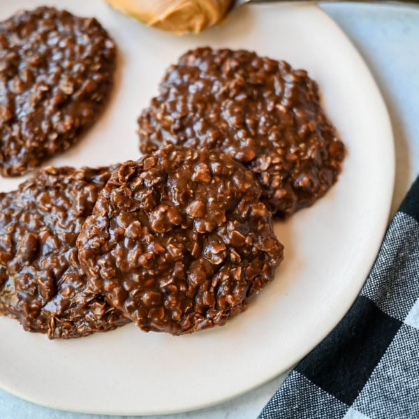 These classic No-Bake Cookies are a quick, nostalgic treat that satisfies a chocolate-peanut butter craving without ever turning on the oven. These easy no-bake cookies are fudgy, chewy, and rich yet take only minutes to make. All you need are 8 ingredients, a saucepan, and a spoon to make the Best No-Bake Cookies.
