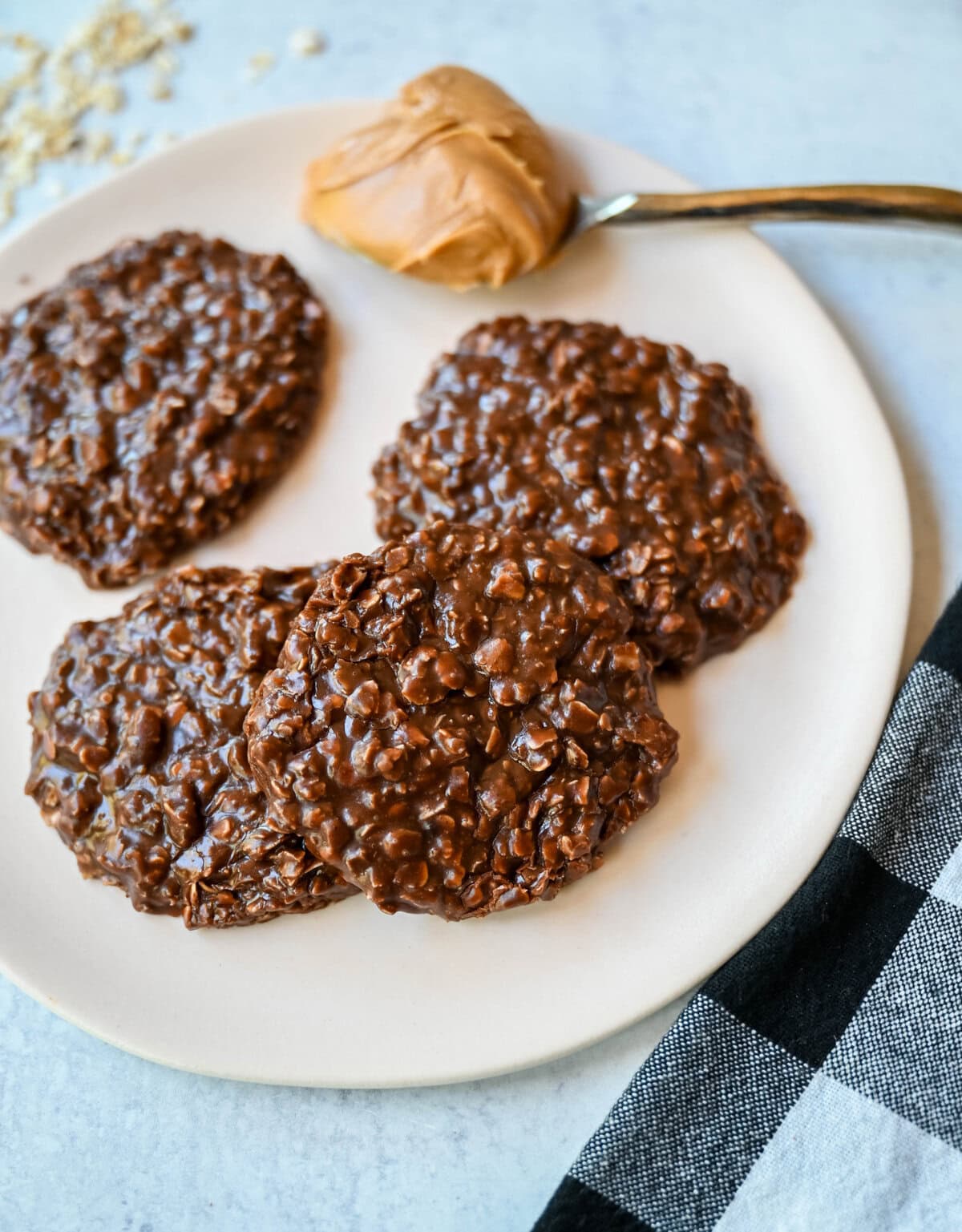 These classic No-Bake Cookies are a quick, nostalgic treat that satisfies a chocolate-peanut butter craving without ever turning on the oven. These easy no-bake cookies are fudgy, chewy, and rich yet take only minutes to make. All you need are 8 ingredients, a saucepan, and a spoon to make the Best No-Bake Cookies.