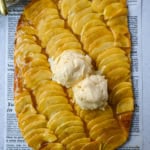 This homemade French Apple Tart recipe features a buttery crust, thinly sliced Granny Smith apples, and a golden apricot glaze for a bakery-style dessert. This Ina Garten French Apple Tart recipe is the best apple tart recipe, perfect for entertaining, holidays or any Fall baking.