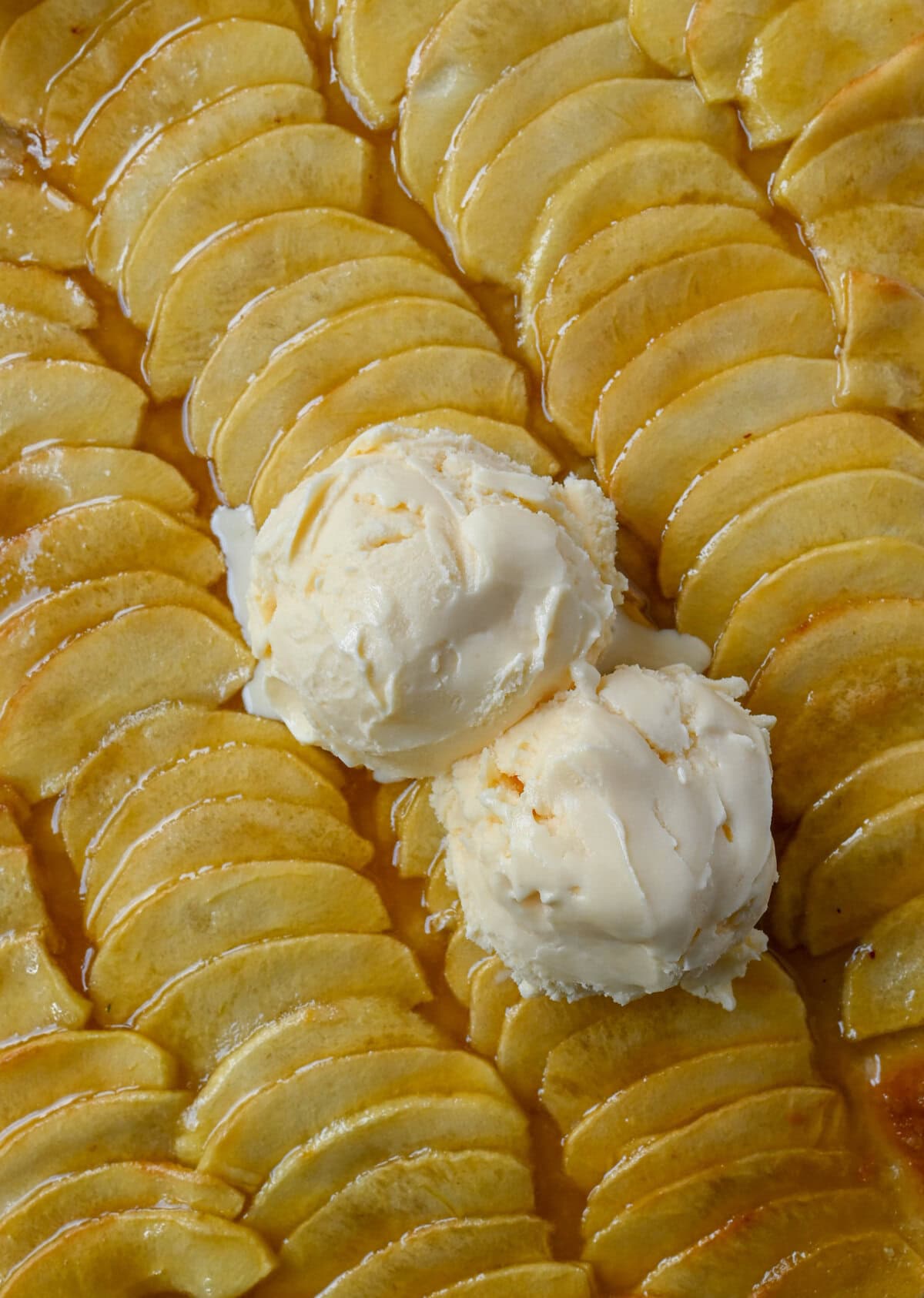 This homemade French Apple Tart recipe features a buttery crust, thinly sliced Granny Smith apples, and a golden apricot glaze for a bakery-style dessert. This Ina Garten French Apple Tart recipe is the best apple tart recipe, perfect for entertaining, holidays or any Fall baking.