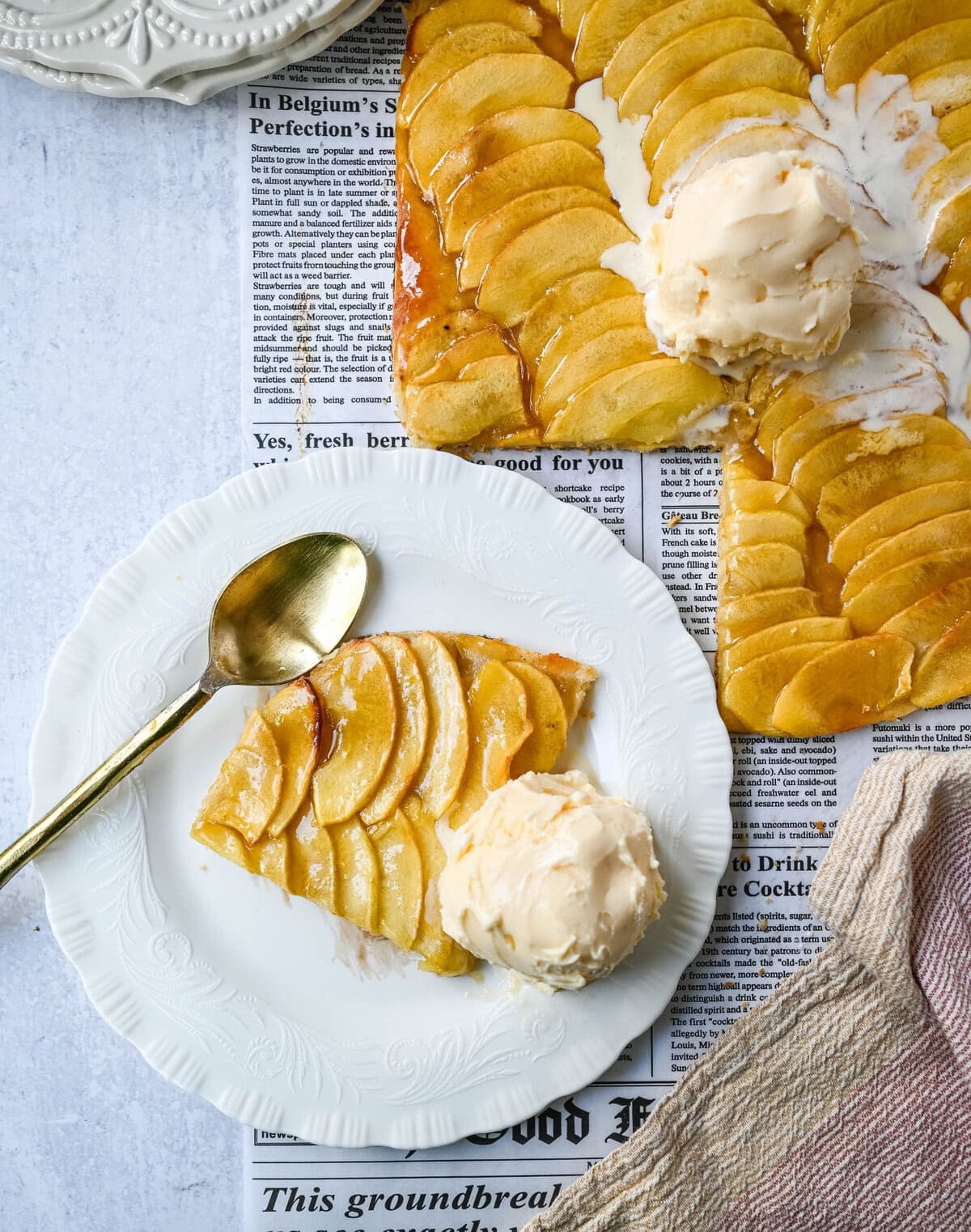 This homemade French Apple Tart recipe features a buttery crust, thinly sliced Granny Smith apples, and a golden apricot glaze for a bakery-style dessert. This Ina Garten French Apple Tart recipe is the best apple tart recipe, perfect for entertaining, holidays or any Fall baking.