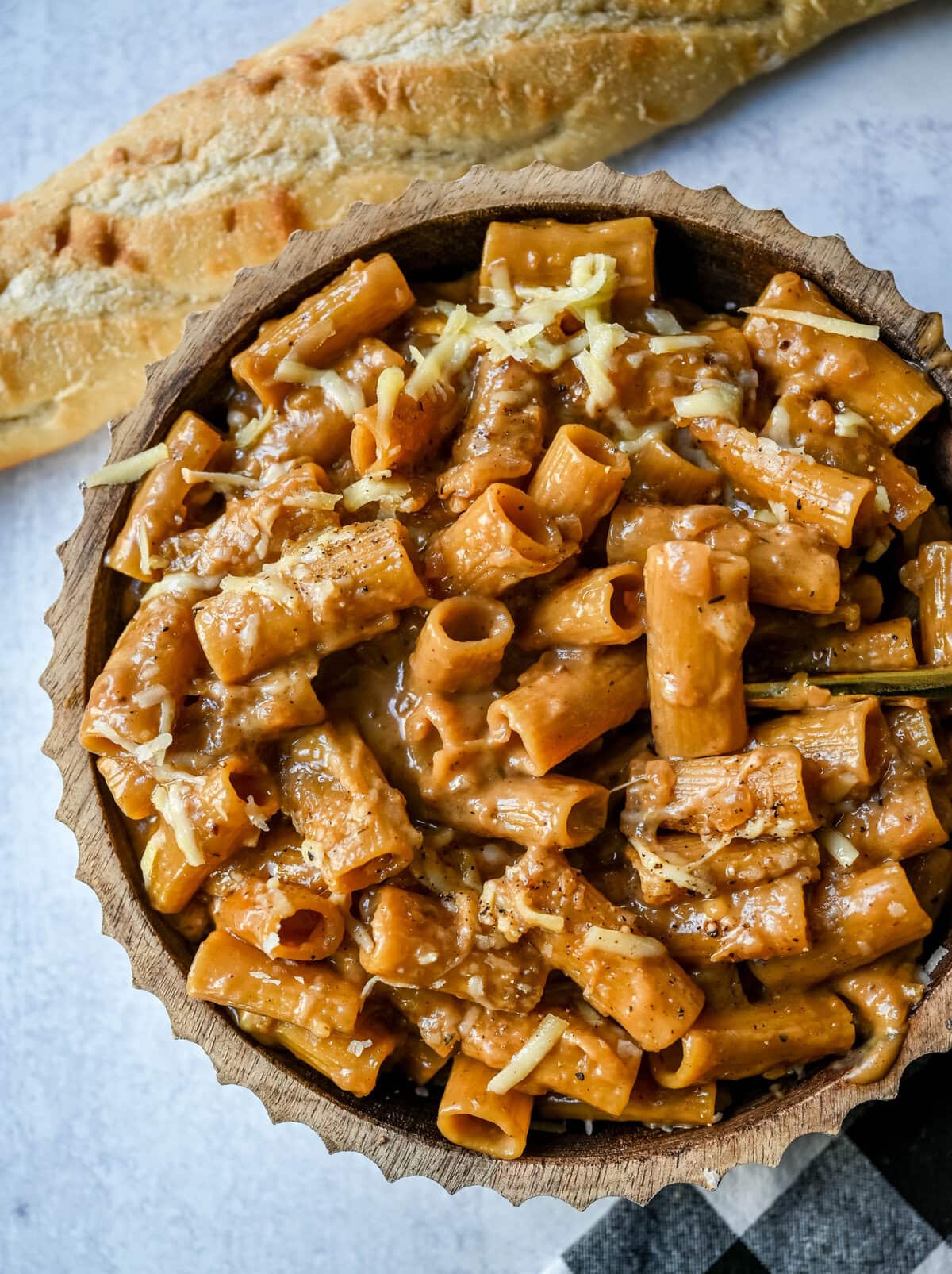 This One Pot French Onion Pasta takes everything you love about French onion soup and turns it into a creamy and cheesy pasta dish. This popular dinner recipe on TikTok is made in just one pot, with caramelized onions, garlic, thyme, and pasta simmered in a savory creamy broth, then topped with Gruyère and Parmesan cheese.