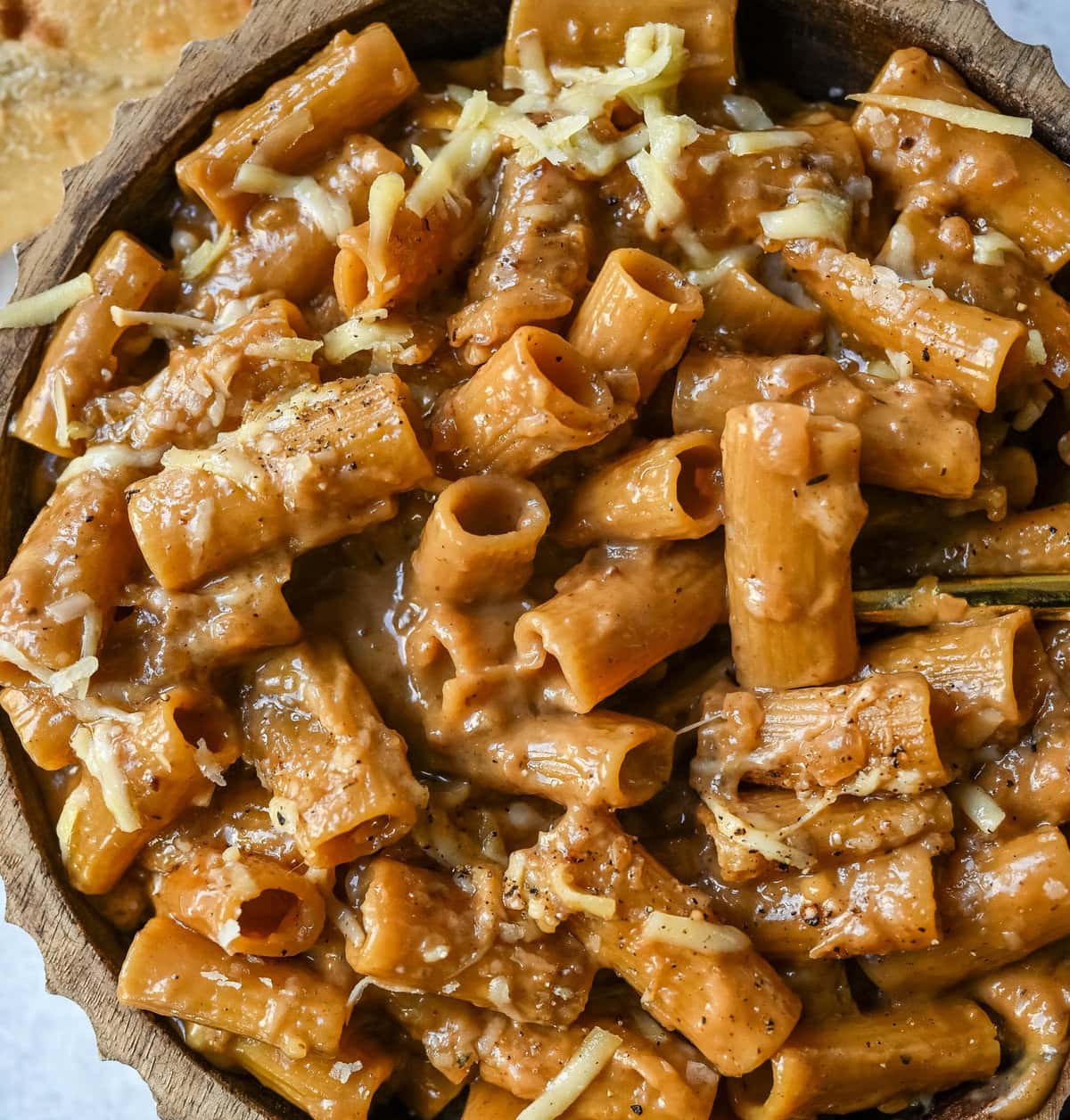 This One Pot French Onion Pasta takes everything you love about French onion soup and turns it into a creamy and cheesy pasta dish. This popular dinner recipe on TikTok is made in just one pot, with caramelized onions, garlic, thyme, and pasta simmered in a savory creamy broth, then topped with Gruyère and Parmesan cheese.