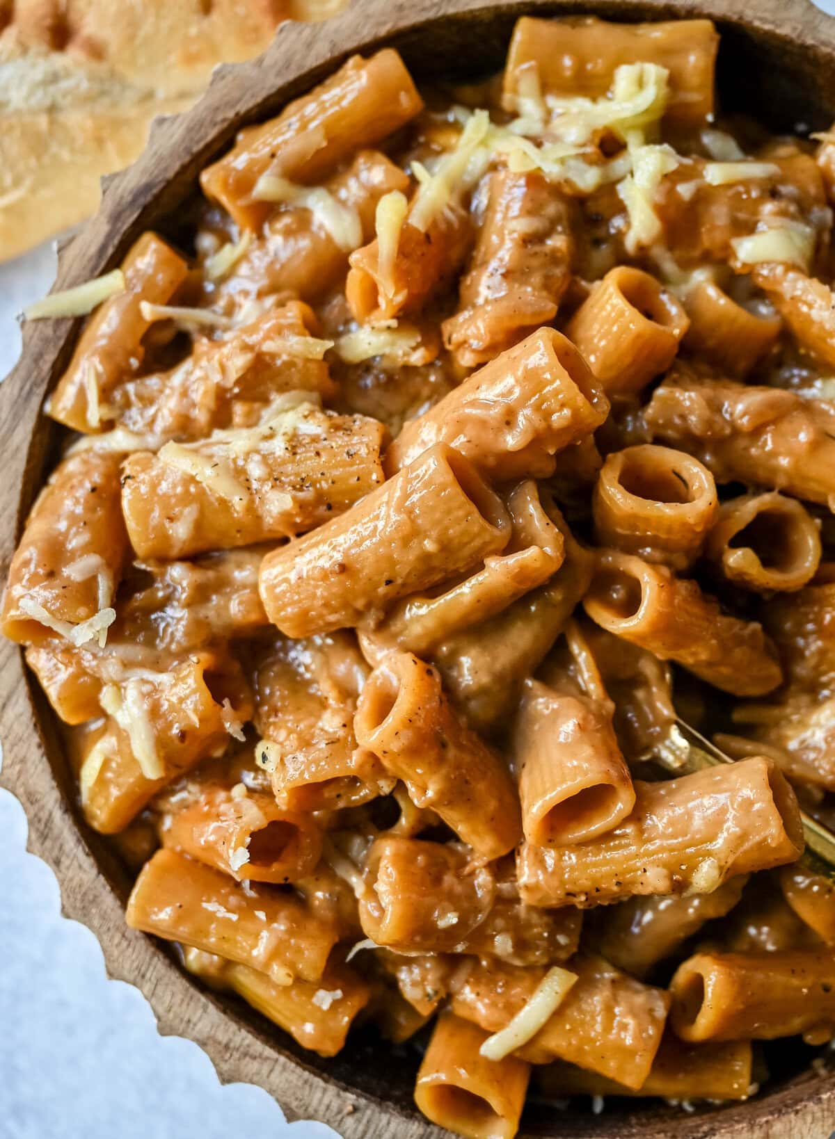 This One Pot French Onion Pasta takes everything you love about French onion soup and turns it into a creamy and cheesy pasta dish. This popular dinner recipe on TikTok is made in just one pot, with caramelized onions, garlic, thyme, and pasta simmered in a savory creamy broth, then topped with Gruyère and Parmesan cheese.