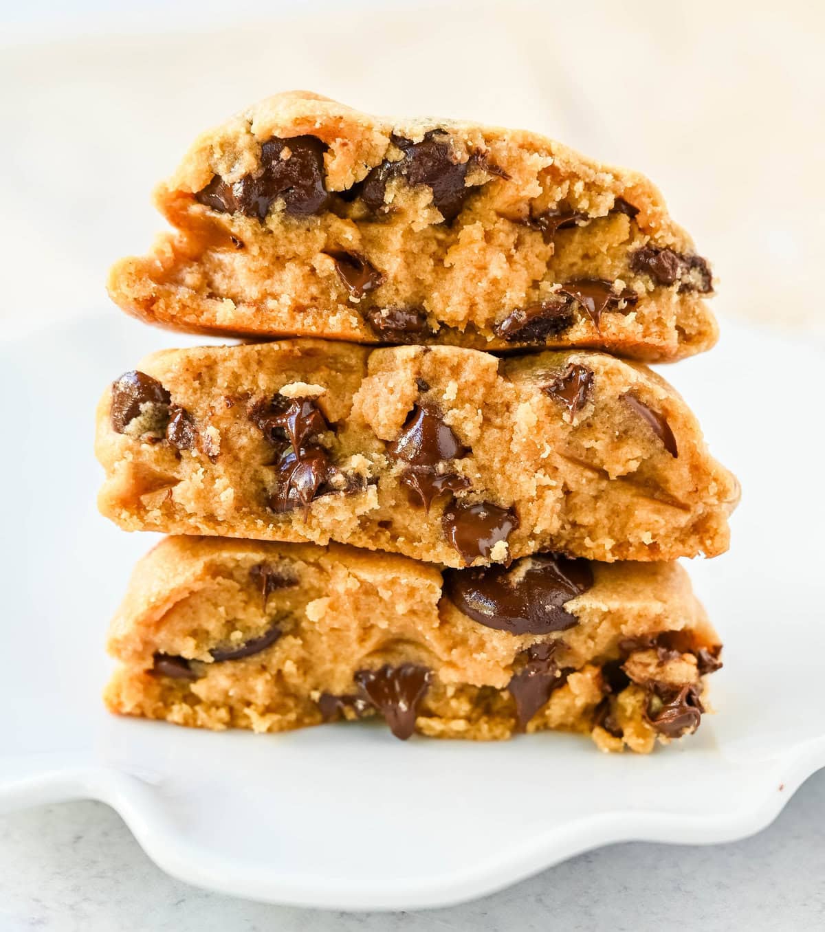 Rich, thick, and soft, these peanut butter chocolate chip cookies taste just like Levain Bakery but made at home. These Levain Bakery Peanut Butter Dark Chocolate Chip cookies are the perfect soft peanut butter chocolate chunk cookie!
