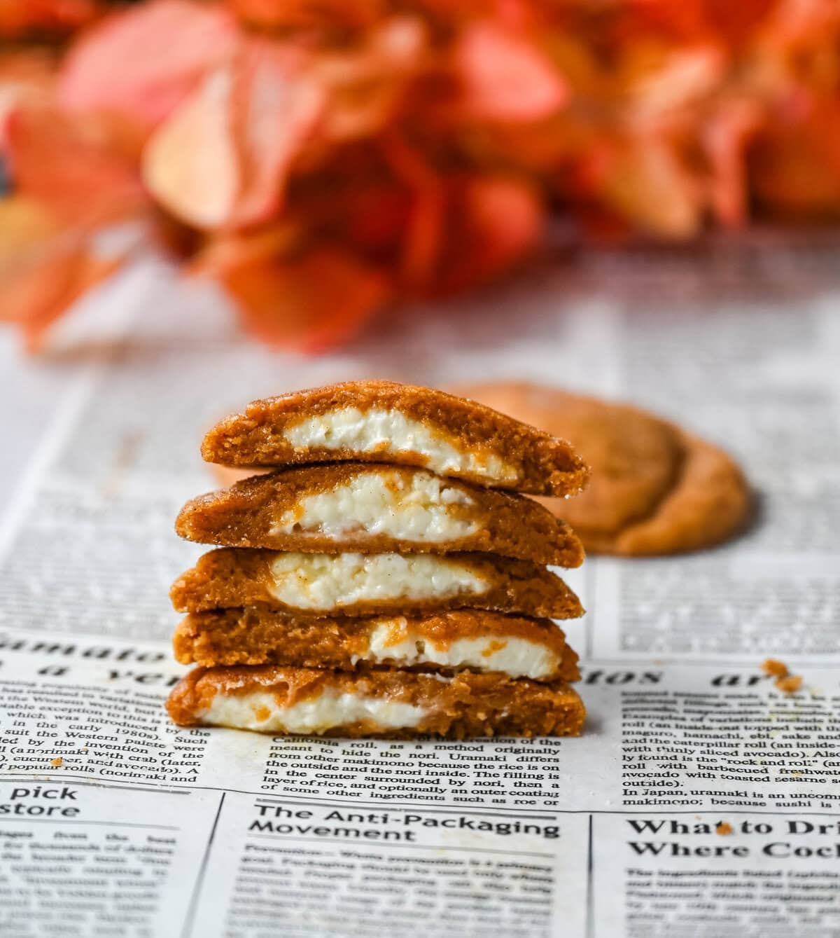 These soft, chewy, pumpkin spice cookies are filled with a cheesecake filling. They are the perfect pumpkin cookie filled with a sweet cream cheese center and rolled into cinnamon sugar. You will love this Best Pumpkin Cheesecake Cookie Recipe!