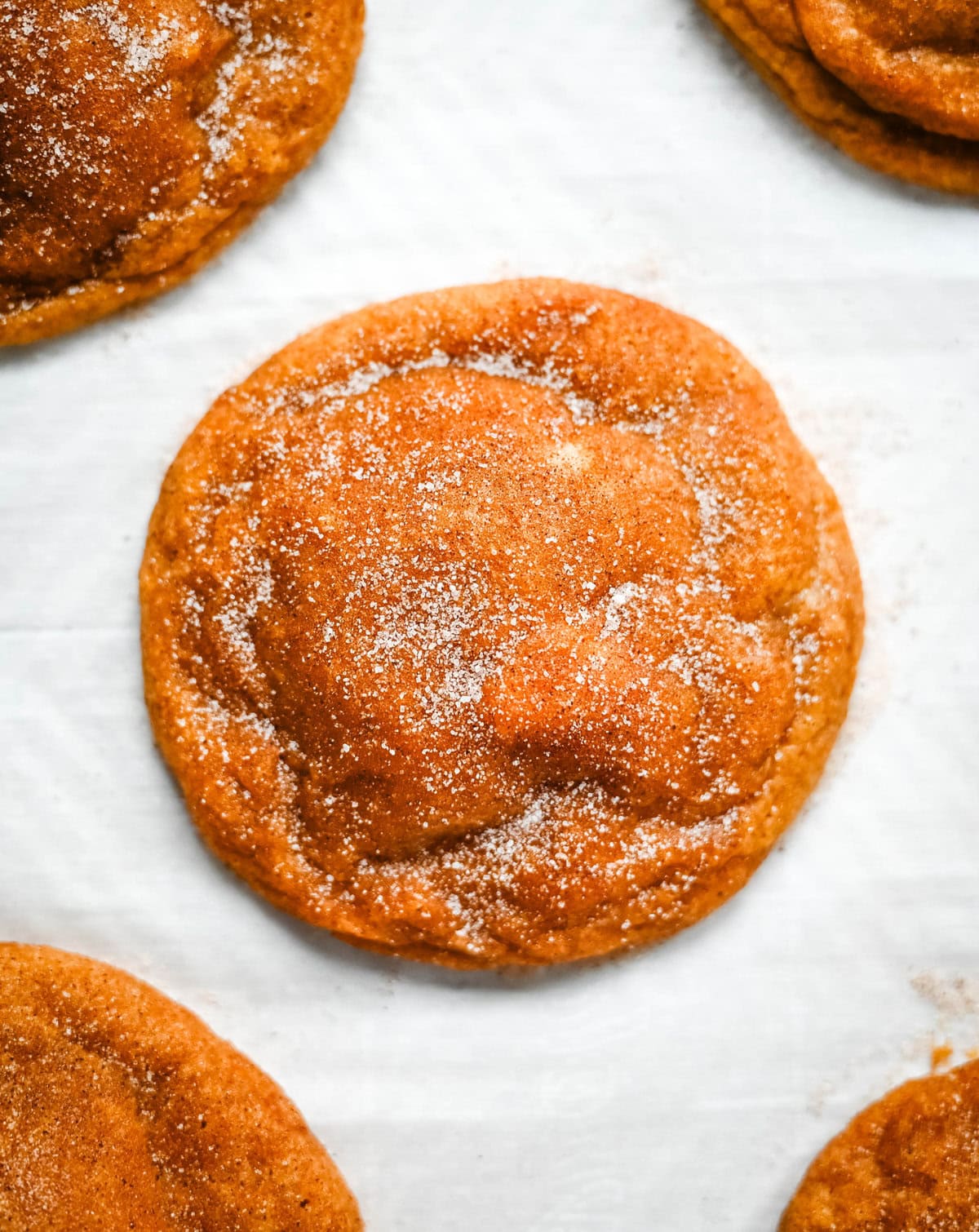 These soft, chewy, pumpkin spice cookies are filled with a cheesecake filling. They are the perfect pumpkin cookie filled with a sweet cream cheese center and rolled into cinnamon sugar. You will love this Best Pumpkin Cheesecake Cookie Recipe!