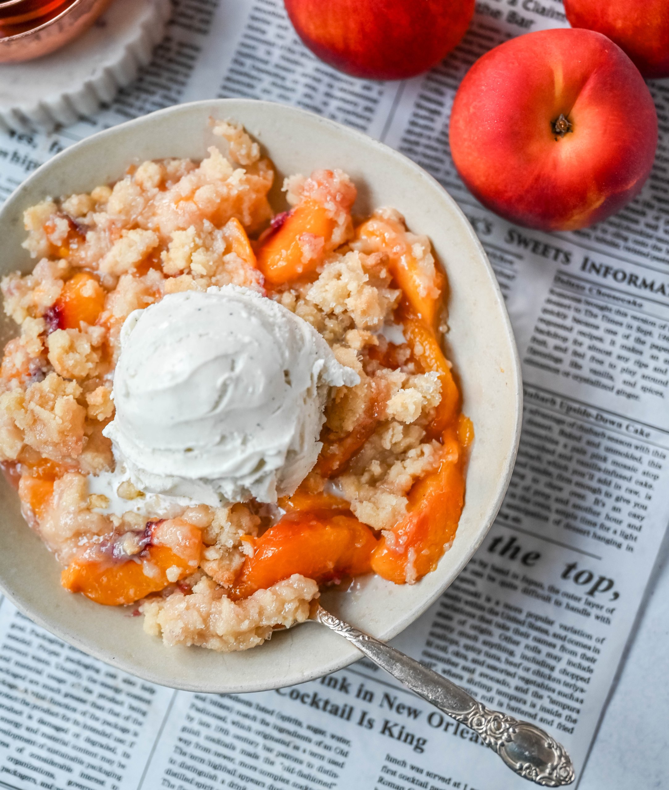 This Homemade Sugar Cookie Peach Cobbler is made with juicy peaches tossed in sugar and topped with a soft, buttery sugar cookie crust, then baked until golden. Serve it warm with a scoop of vanilla ice cream for the best peach cobbler recipe with a sugar cookie twist!