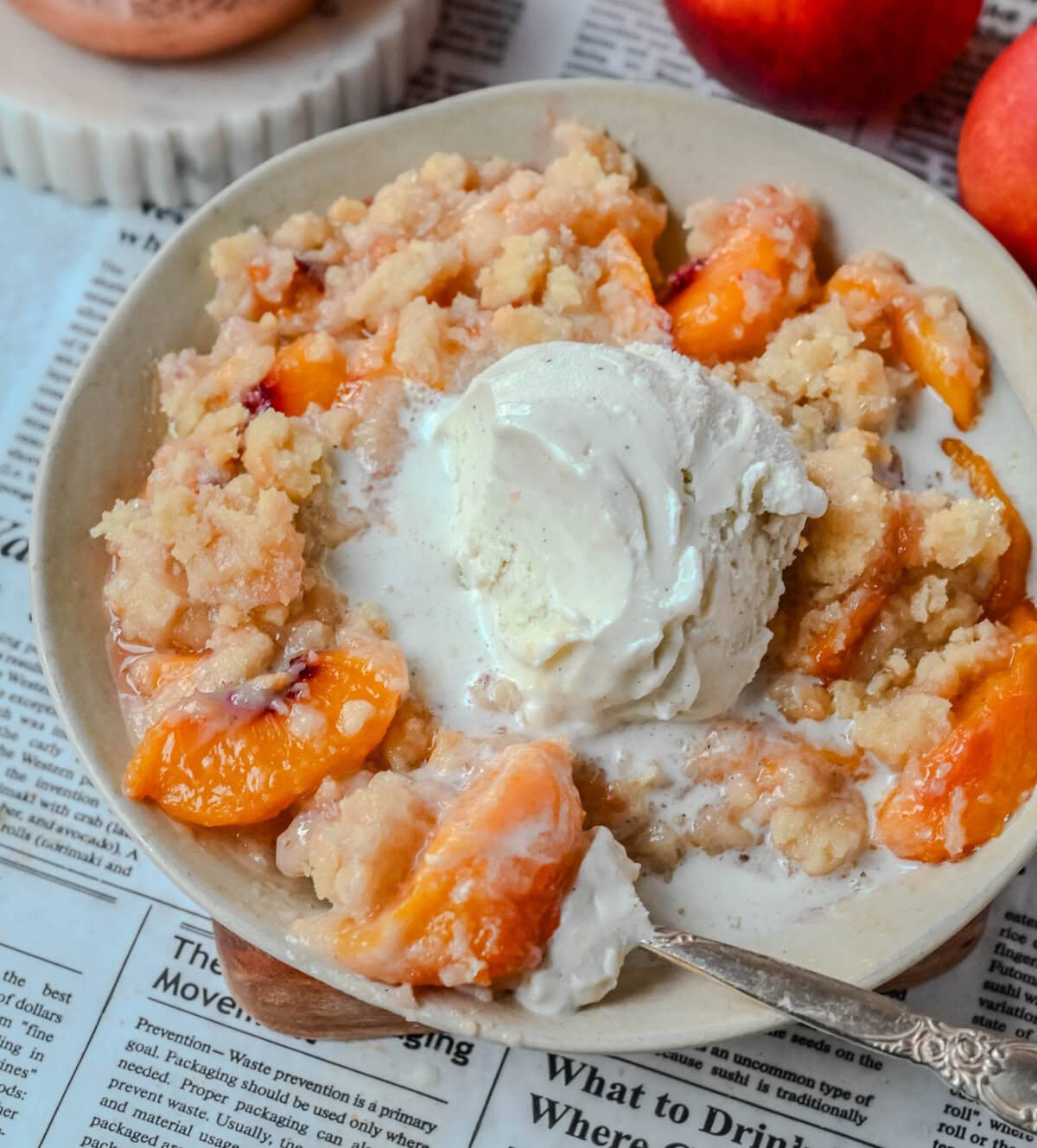 This Homemade Sugar Cookie Peach Cobbler is made with juicy peaches tossed in sugar and topped with a soft, buttery sugar cookie crust, then baked until golden. Serve it warm with a scoop of vanilla ice cream for the best peach cobbler recipe with a sugar cookie twist!