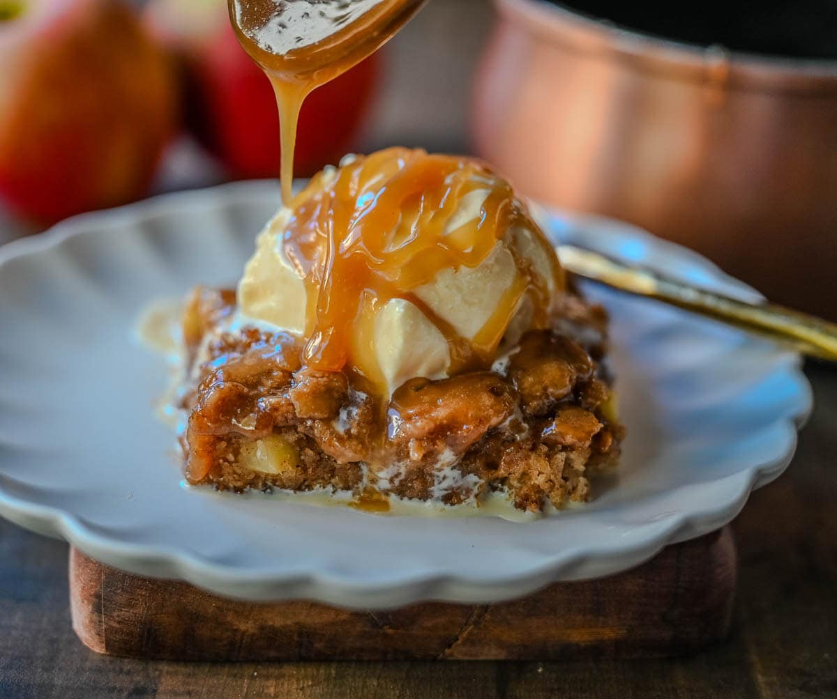 There’s something magical about warm apple cake drizzled with golden salted caramel sauce. This Apple Cake with Salted Caramel is a combination of tender spiced apples, moist crumb, and gooey caramel makes this the ultimate fall dessert — perfect for Thanksgiving, cozy weekends, or when you are craving a Fall dessert.