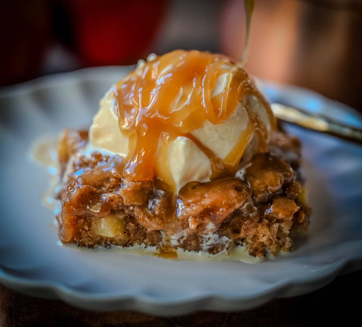There’s something magical about warm apple cake drizzled with golden salted caramel sauce. This Apple Cake with Salted Caramel is a combination of tender spiced apples, moist crumb, and gooey caramel makes this the ultimate fall dessert — perfect for Thanksgiving, cozy weekends, or when you are craving a Fall dessert.