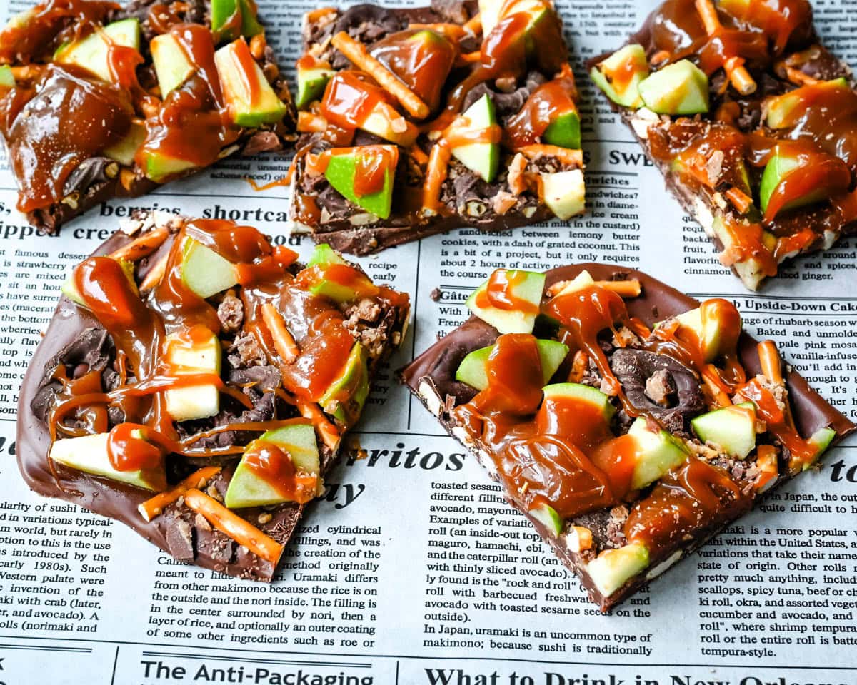 This Caramel Apple Bark is an easy no-bake Fall treat and made with fresh apples, buttery caramel, crunchy pretzels, and rich chocolate. This quick and easy Fall dessert is absolutely delicious and a crowd favorite!