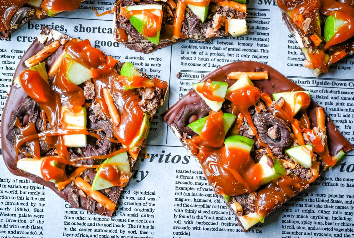 This Caramel Apple Bark is an easy no-bake Fall treat and made with fresh apples, buttery caramel, crunchy pretzels, and rich chocolate. This quick and easy Fall dessert is absolutely delicious and a crowd favorite!