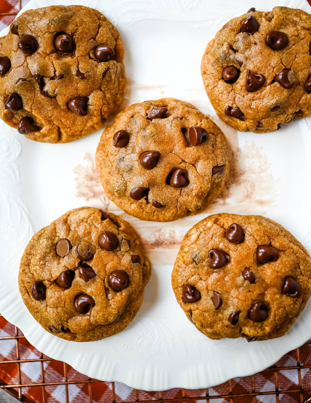 This Brown Butter Pumpkin Chocolate Chip Cookie Recipe combines warm spices, pumpkin, and rich brown butter flavor to create the perfect Fall cookie. This is the best soft and chewy pumpkin cookie!