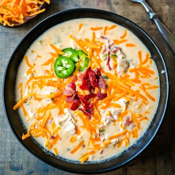 This creamy chicken jalapeño popper soup is everything you love about jalapeño poppers in a cozy bowl. Loaded with bacon, shredded chicken, cream cheese, and cheddar, it’s the ultimate comfort food with a spicy kick. The best jalapeño popper soup!