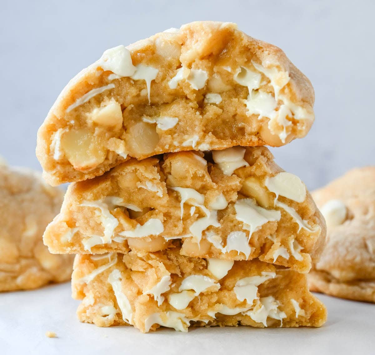 Soft in the center and crisp on the edges, these Levain Bakery White Chocolate Macadamia Cookies taste straight out of the bakery. This White Chocolate Macadamia Nut cookie recipe creates thick, buttery cookies loaded with creamy white chocolate chips and toasted macadamia nuts.