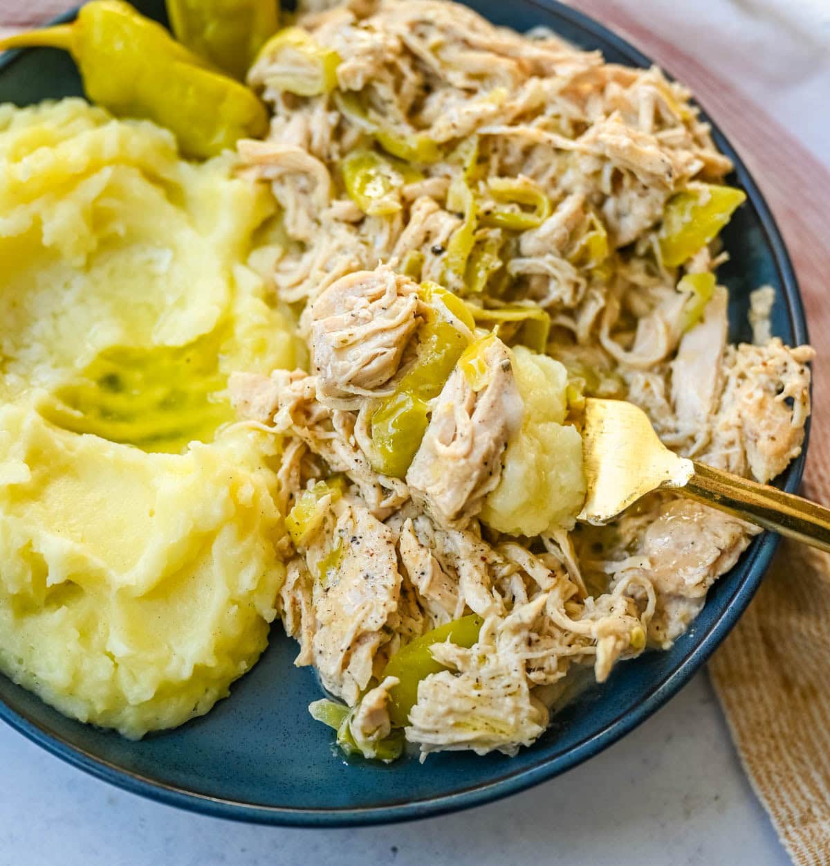 Looking for a new slow cooker chicken recipe? This Slow Cooker Boursin Chicken is rich, creamy, and packed with flavor thanks to garlic herb Boursin cheese, ranch seasoning, and pepperoncini's. The crockpot does all the work, giving you a perfectly tender chicken dinner recipe! You will love this Mississippi Chicken!