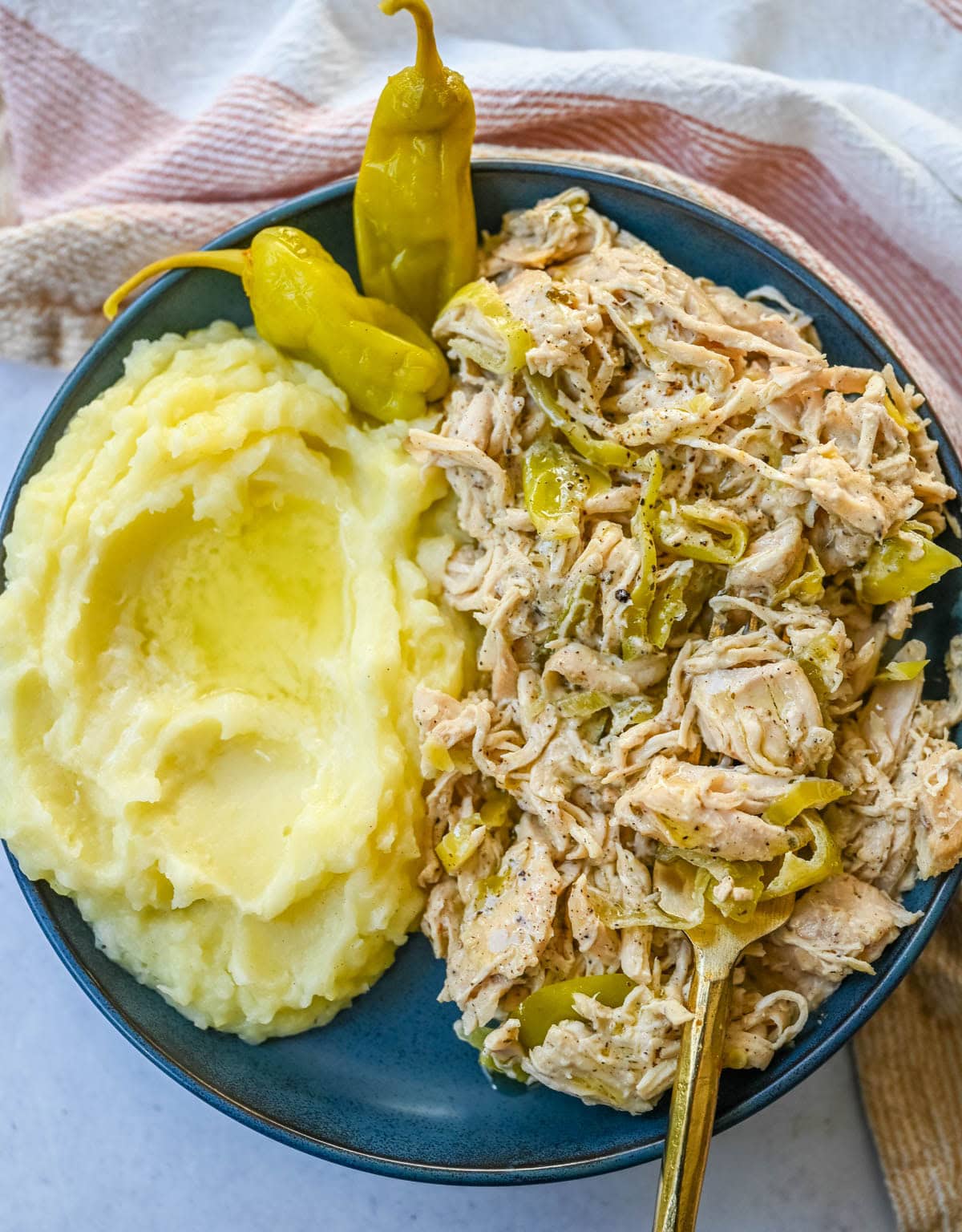 Looking for a new slow cooker chicken recipe? This Slow Cooker Boursin Chicken is rich, creamy, and packed with flavor thanks to garlic herb Boursin cheese, ranch seasoning, and pepperoncini's. The crockpot does all the work, giving you a perfectly tender chicken dinner recipe! You will love this Mississippi Chicken!