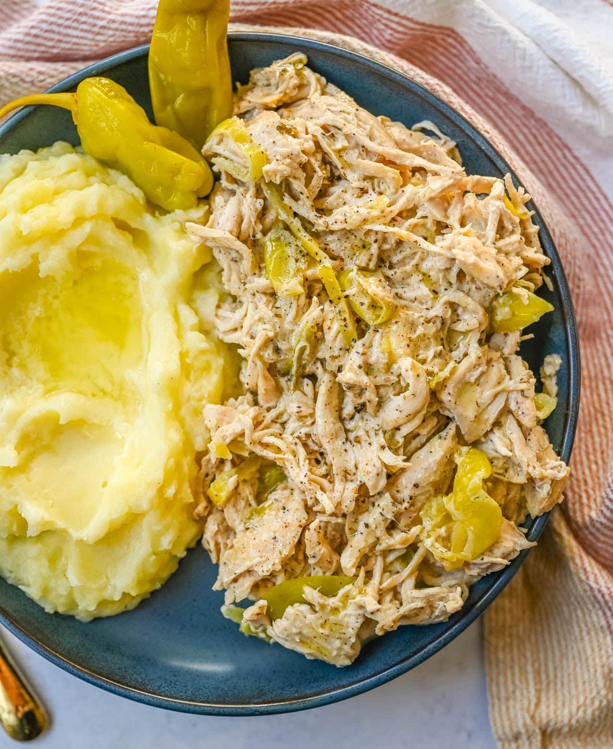 Looking for a new slow cooker chicken recipe? This Slow Cooker Boursin Chicken is rich, creamy, and packed with flavor thanks to garlic herb Boursin cheese, ranch seasoning, and pepperoncini's. The crockpot does all the work, giving you a perfectly tender chicken dinner recipe! You will love this Mississippi Chicken!