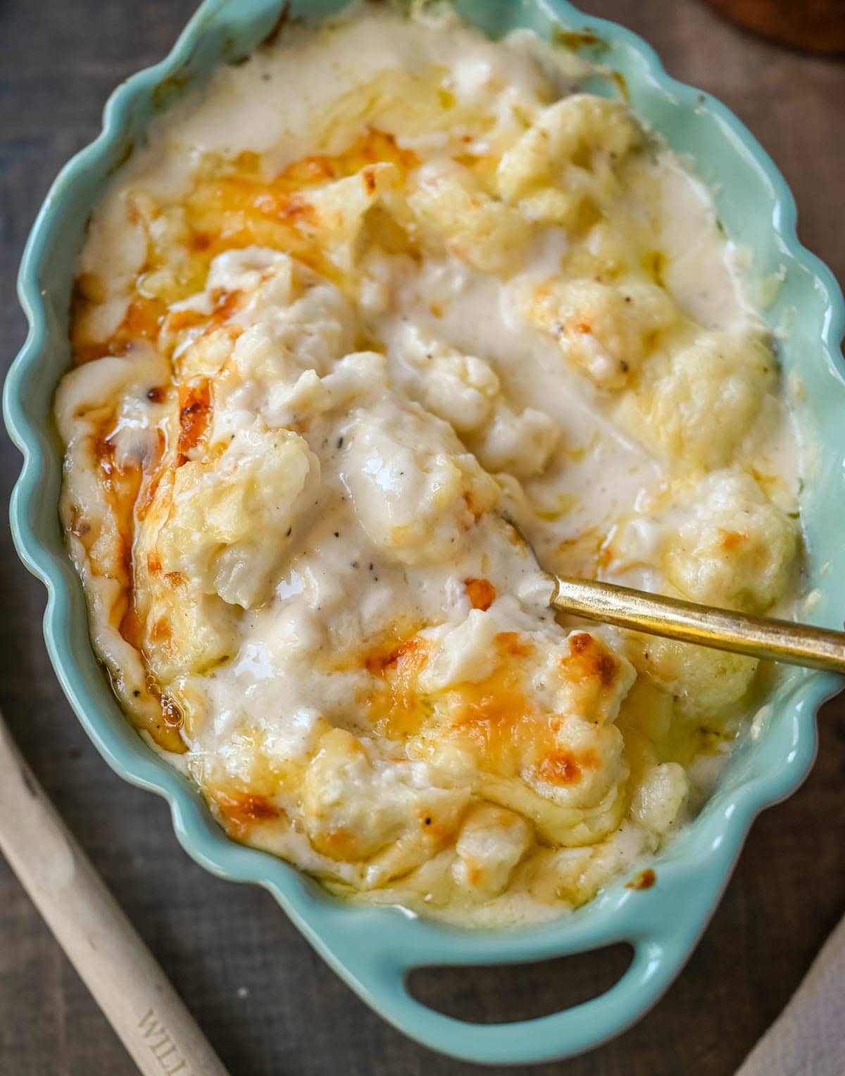 This easy creamy cauliflower gratin is the perfect cheesy side dish for Thanksgiving, Christmas, or any dinner. Made with Gruyère, sharp cheddar, and tender cauliflower, it’s a rich, flavorful, and easy side. The best baked cauliflower gratin!