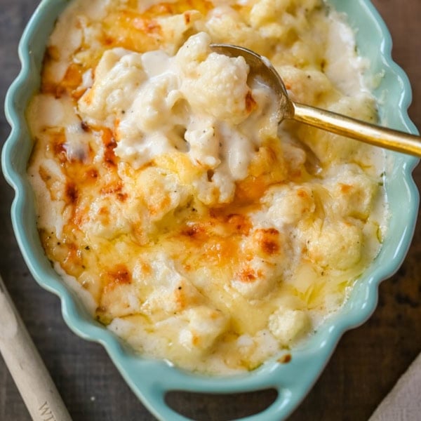 This easy creamy cauliflower gratin is the perfect cheesy side dish for Thanksgiving, Christmas, or any dinner. Made with Gruyère, sharp cheddar, and tender cauliflower, it’s a rich, flavorful, and easy side. The best baked cauliflower gratin!